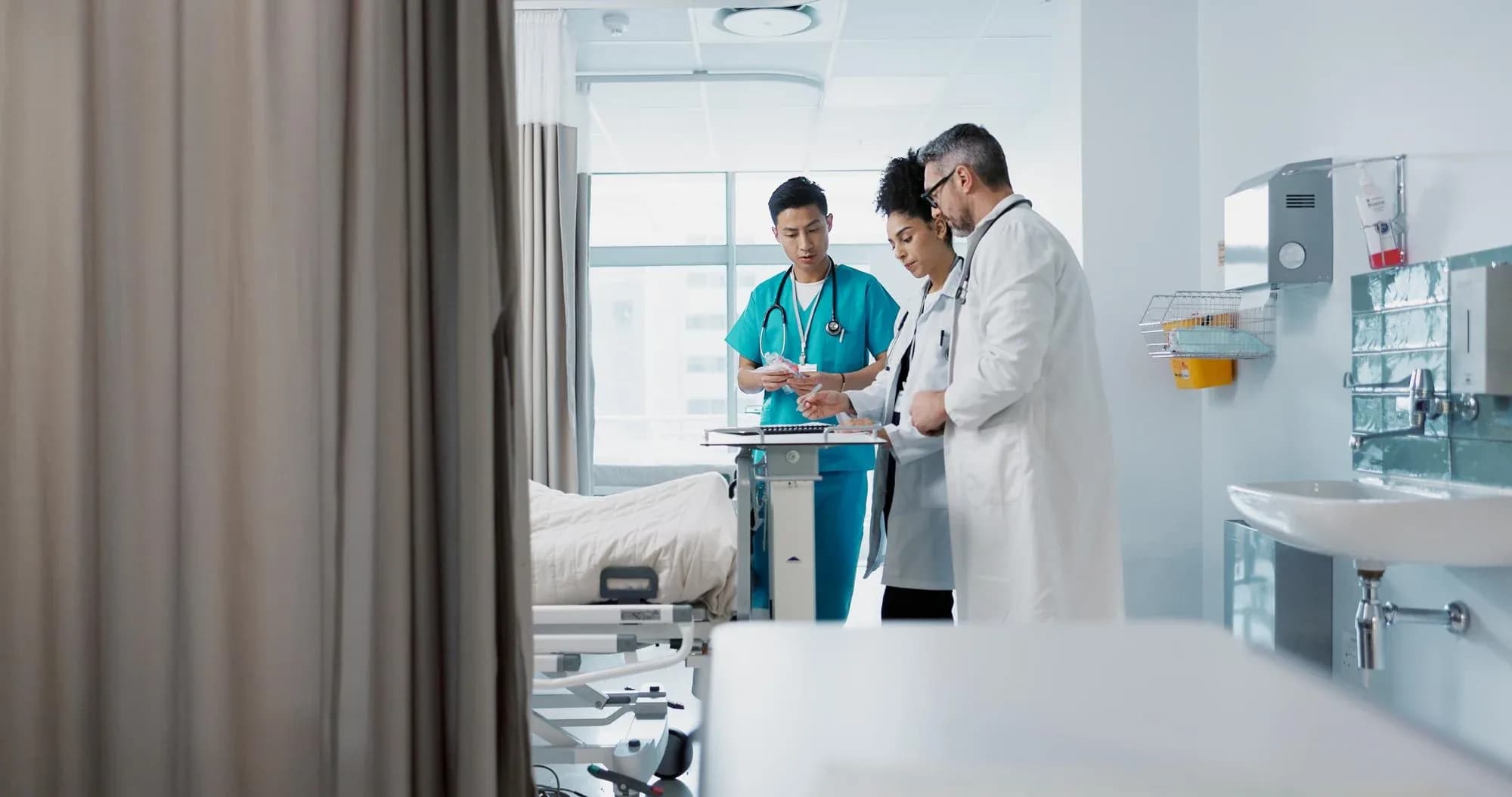 A clinician reviewing patient information on a tablet